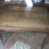 Old side table with curved legs