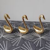 Brass swans