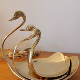 Empty brass swan pocket