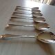 Set of 6 small silver metal spoons