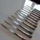 12 silver metal dessert or cheese knives