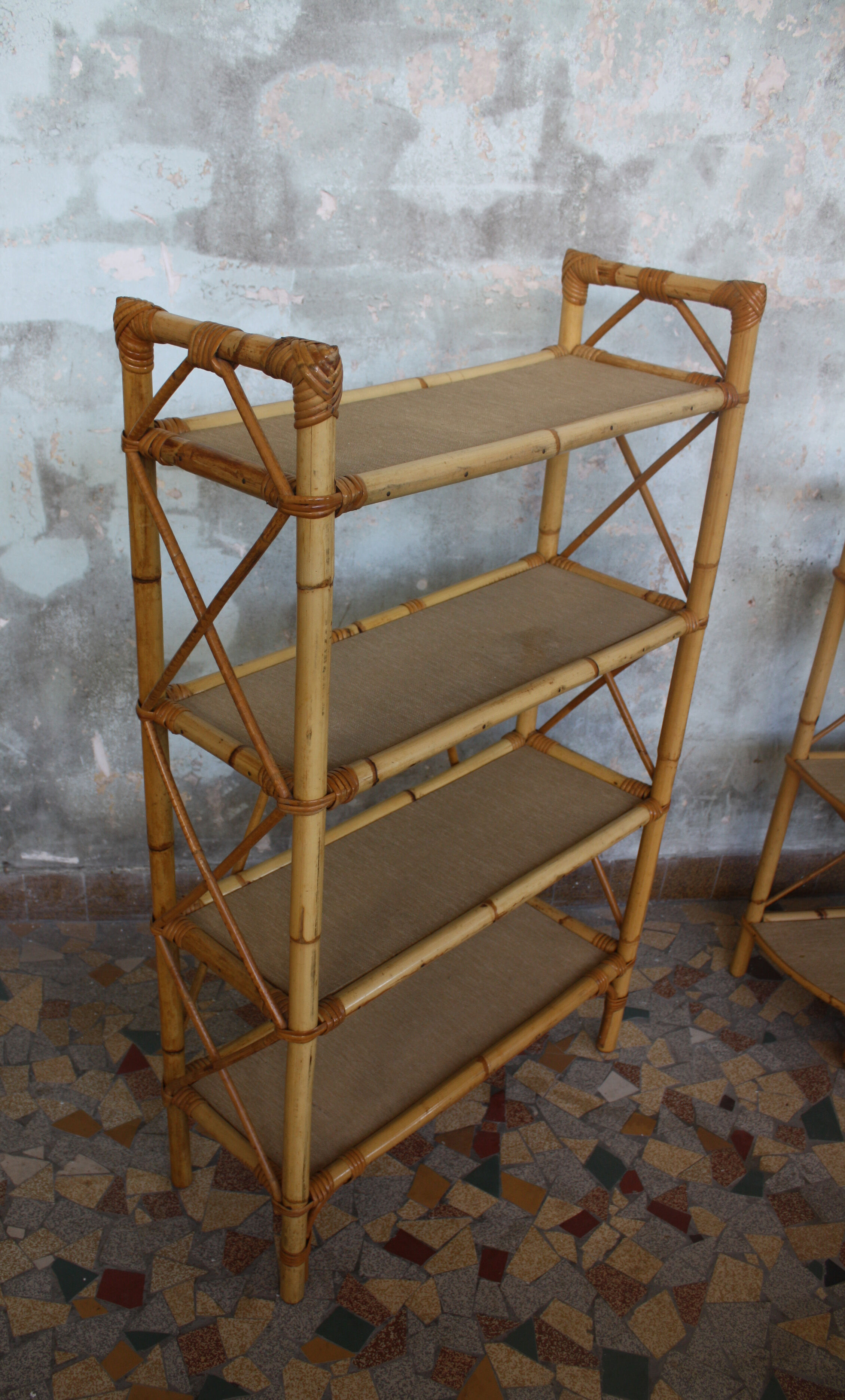 Pair of rattan shelves including a corner shelf