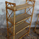 Pair of rattan shelves including a corner shelf