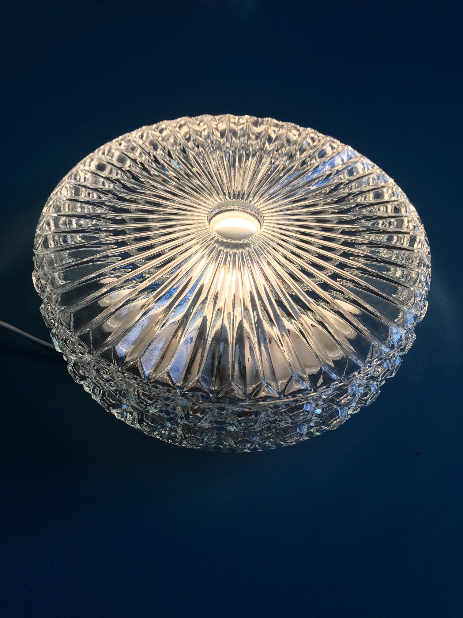 Round ceiling light in chiseled glass