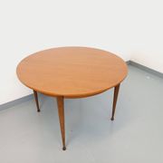 Round dining table in vintage Scandinavian style from the 50s and 60s in teak.
