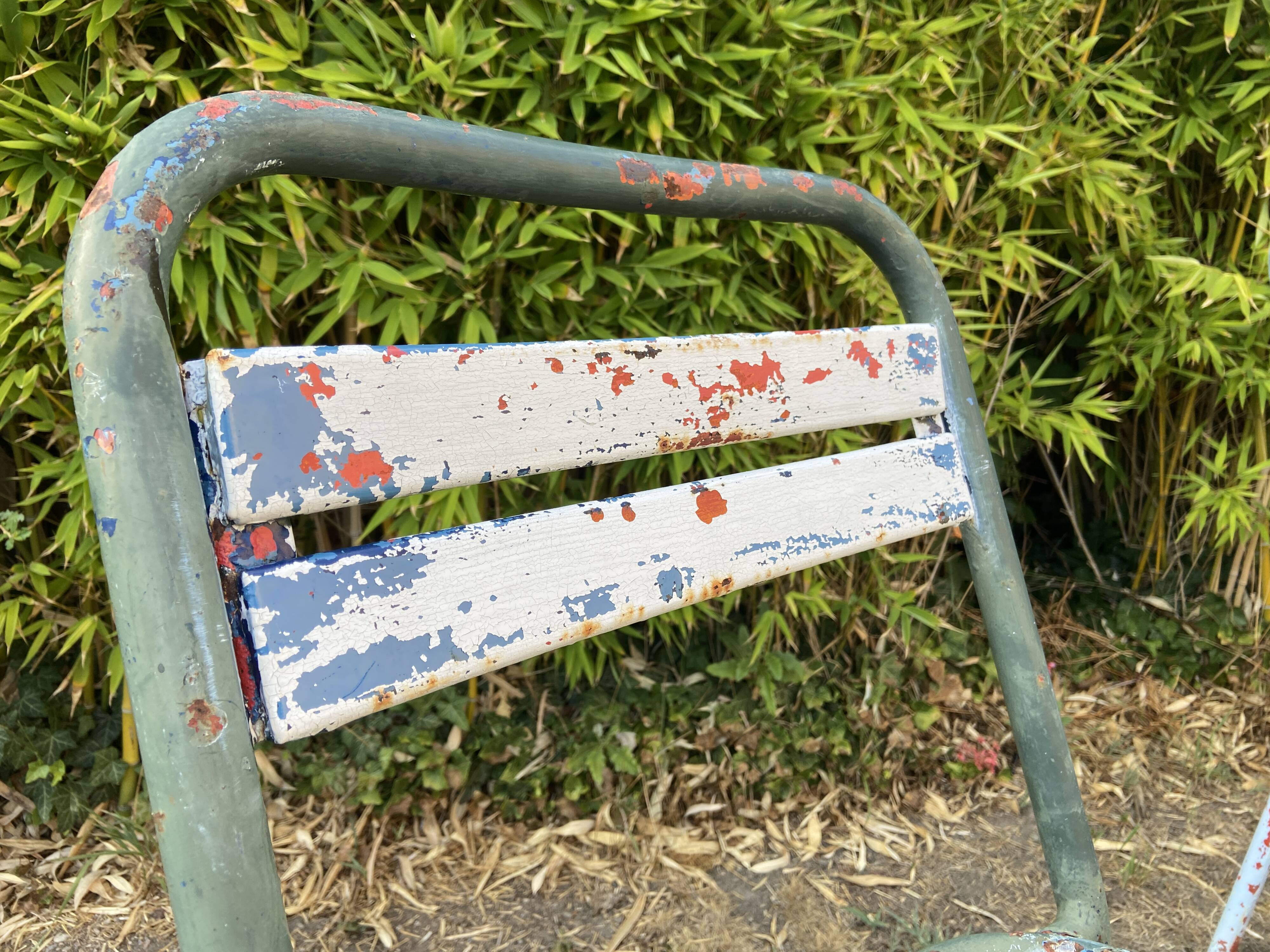 4 mismatched chairs Tolix brasserie bistro terrace French bistro 60s