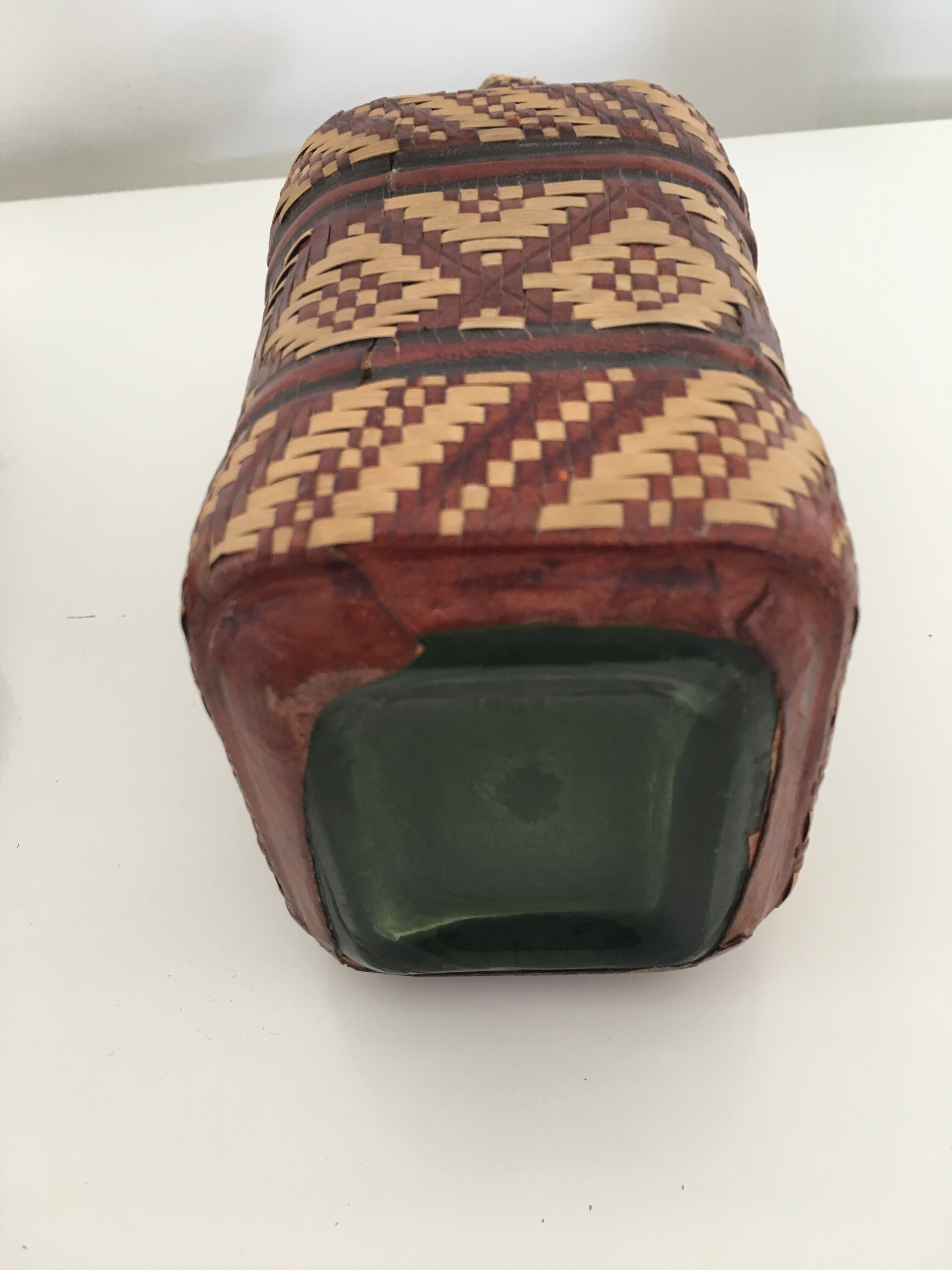 Lot of 2 ethnic leather-wrapped bottles and box