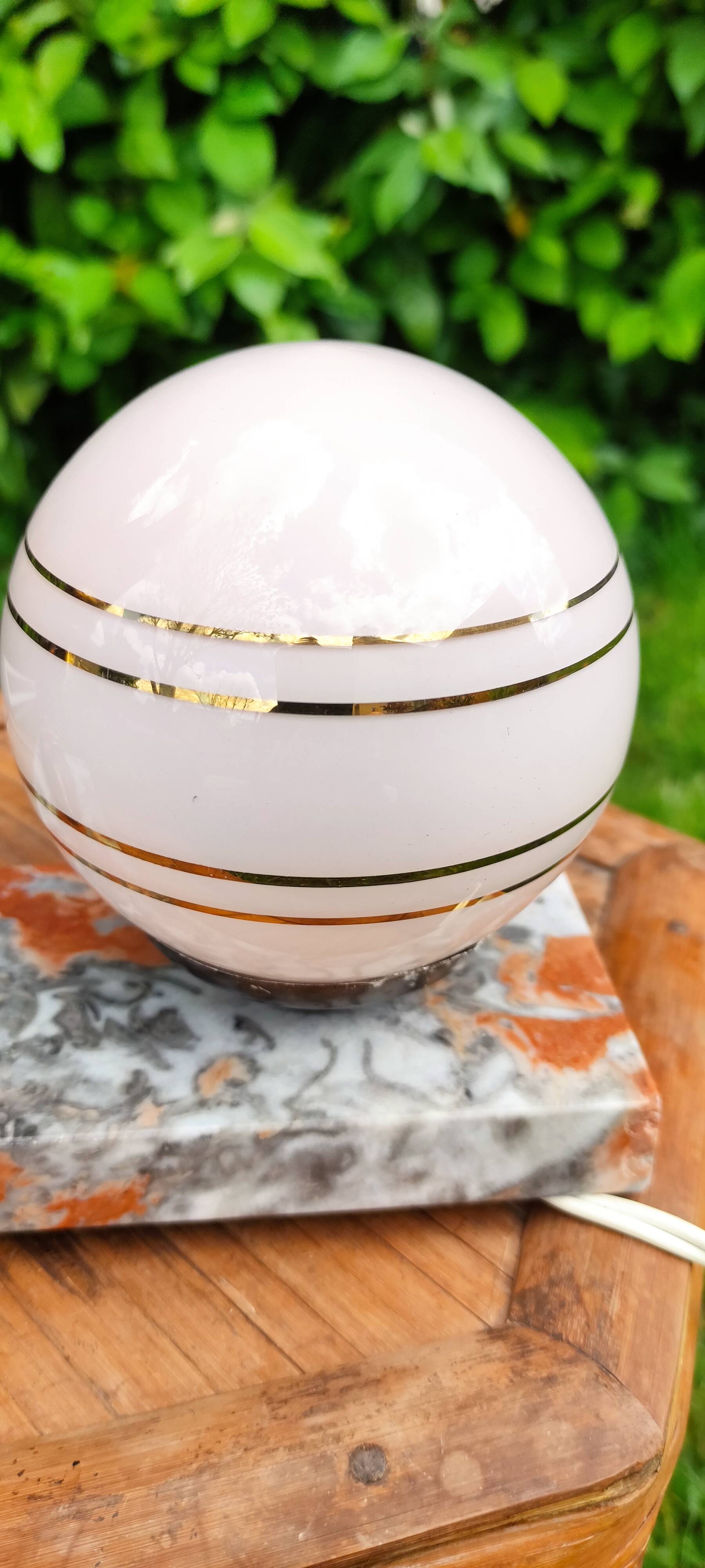 Globe and marble art deco lamp