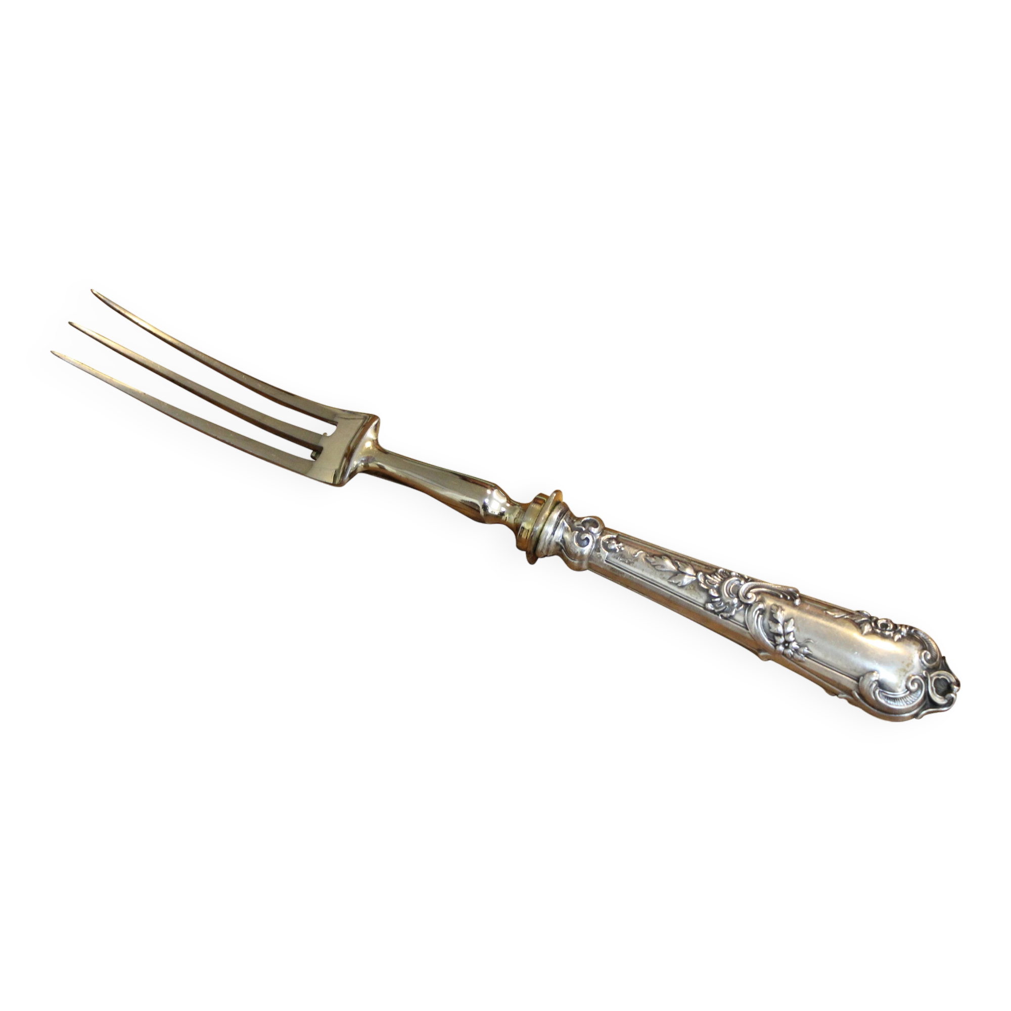 Un service à gigot argenté comprenant une fourchette et un couteau