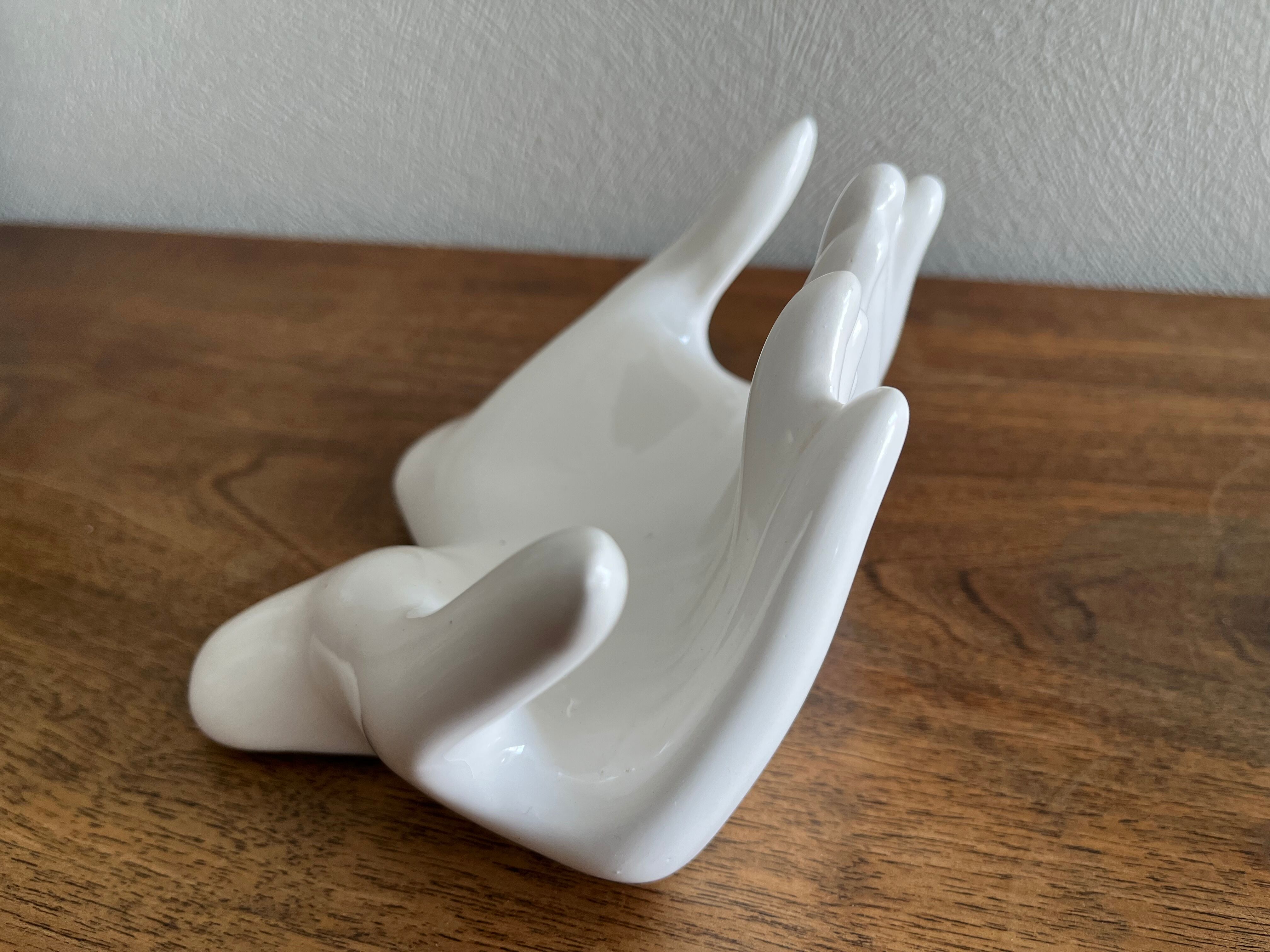 Empty white ceramic hand pocket