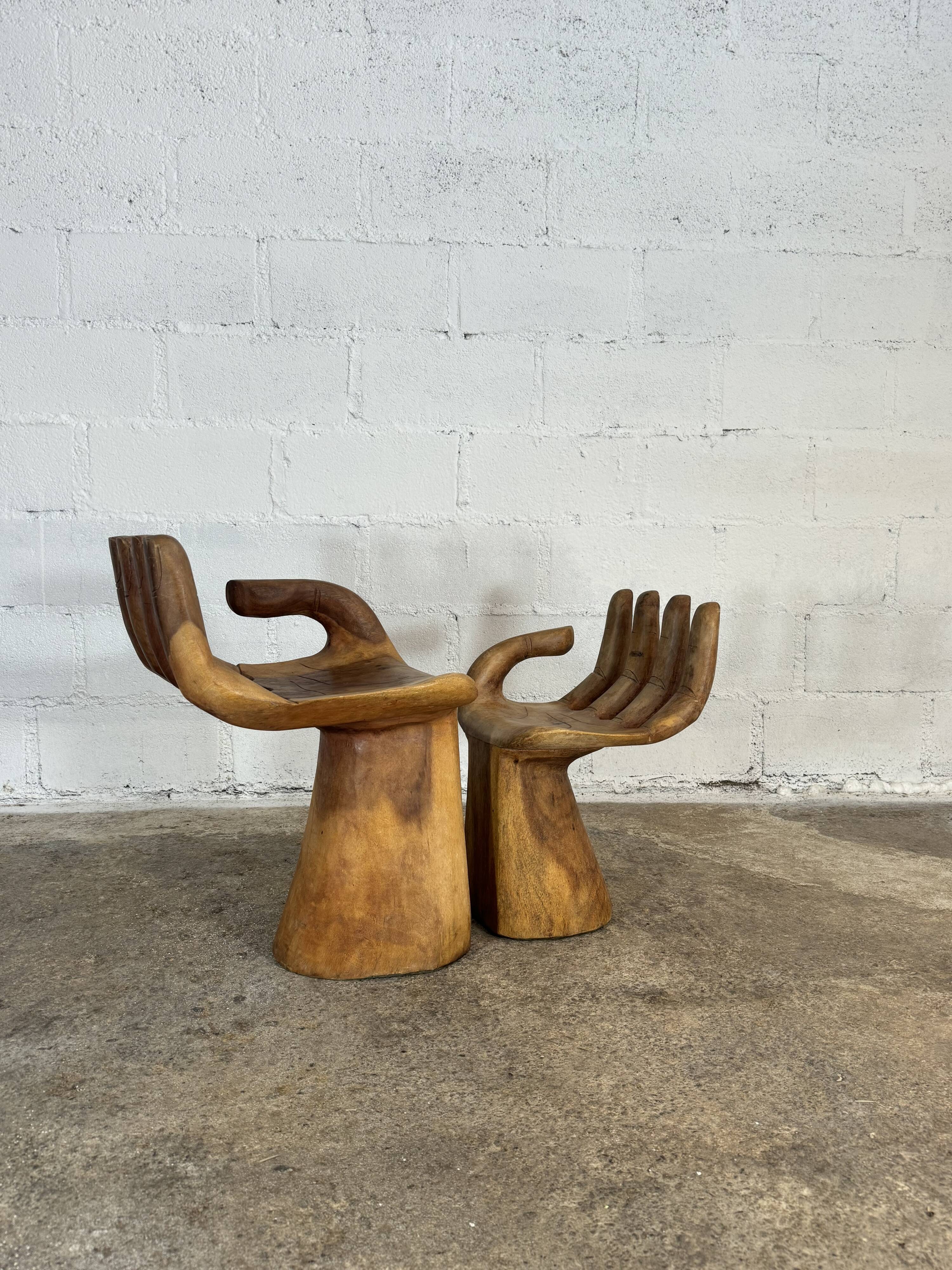 Hand carved chairs in the Pedro Fiedeberg style