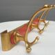 Vintage bistro coat rack with 3 patères gold and red hooks