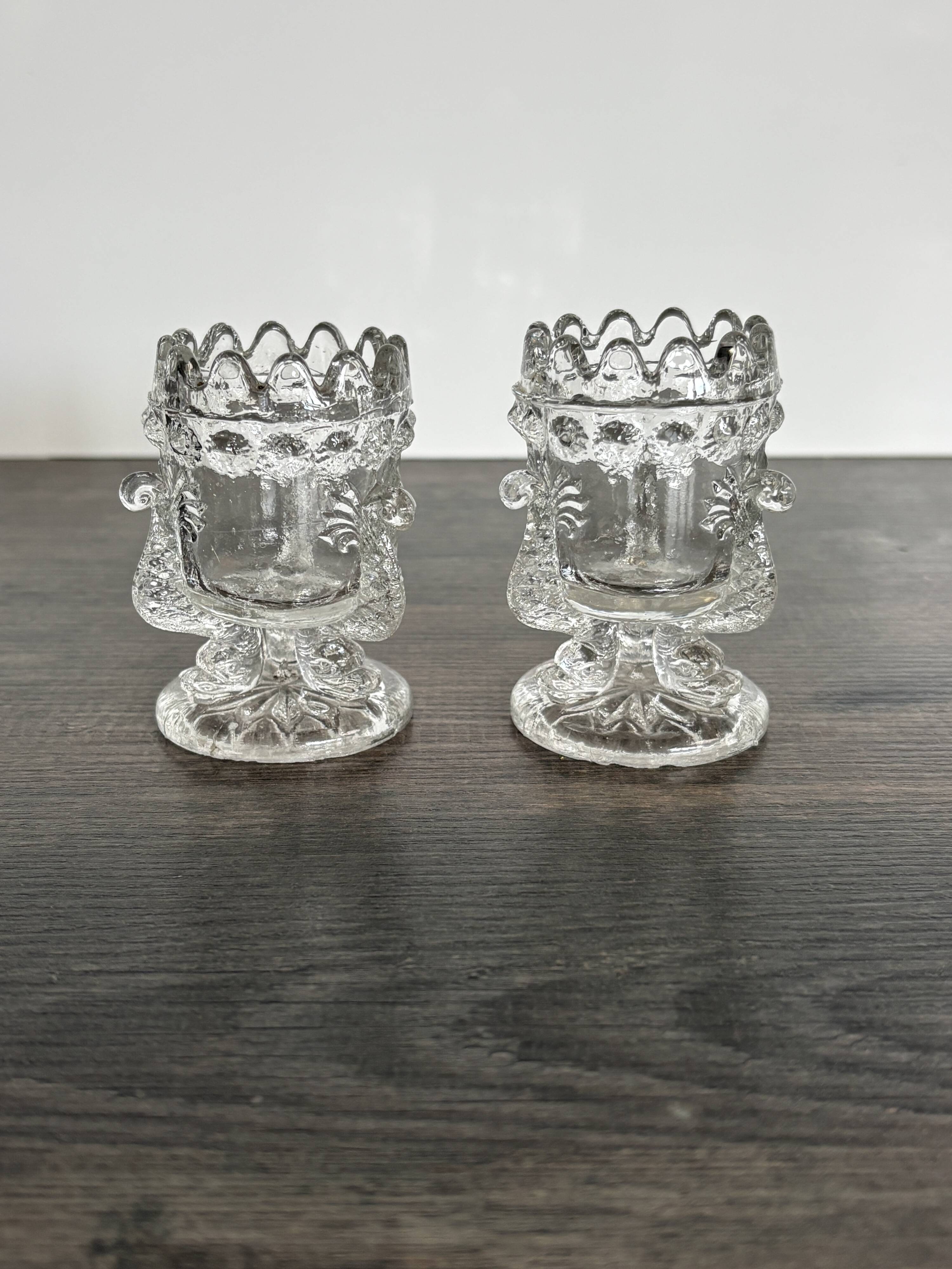 Pair of antique moulded glass egg cups
