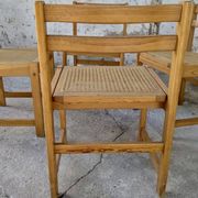 Série de 4 chaises vintage en pin assise cannage