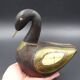 Wooden and brass swan