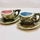 2 cups + 2 saucers in majolica slip ceramic zoomorphic snail shape