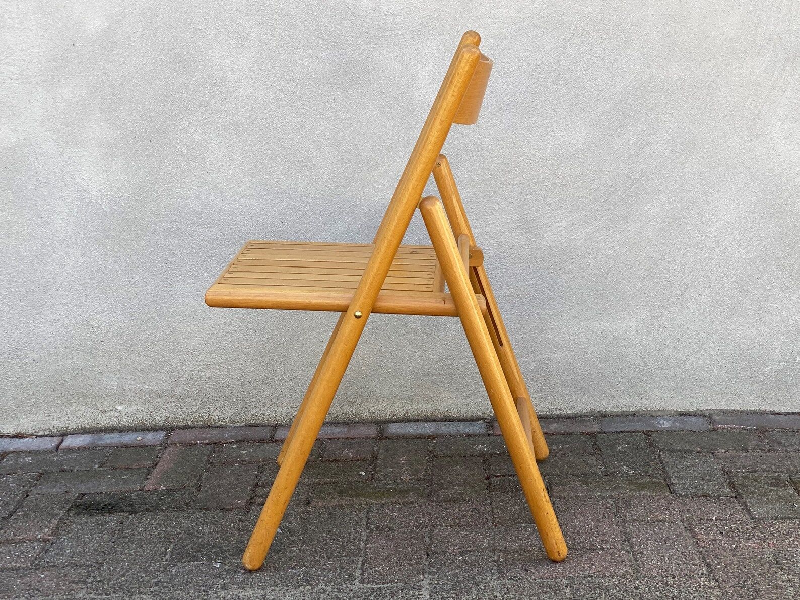 Mid Century wooden folding chair with a slat seat