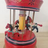 Carousel with functional music box
