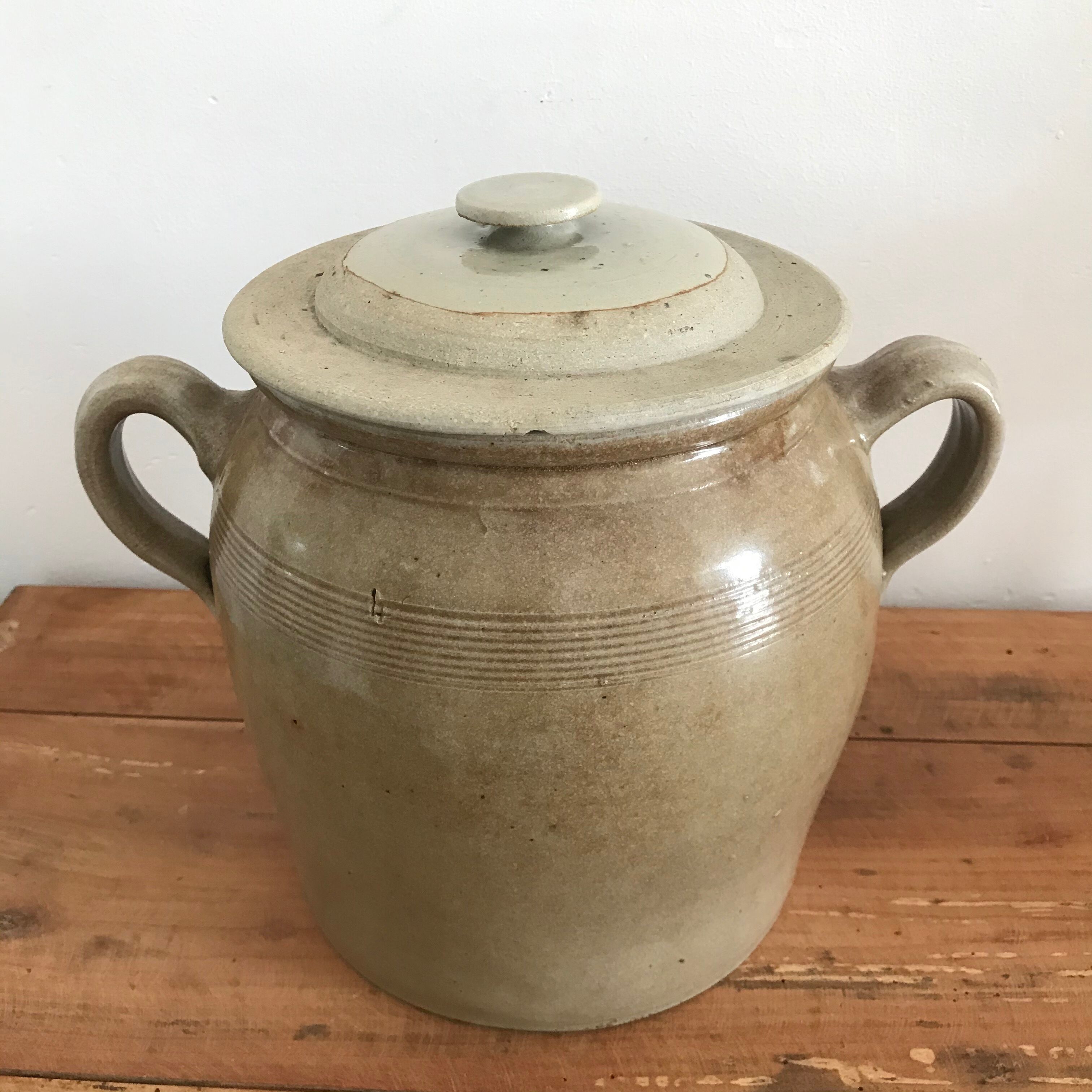 Eared sandstone jar and lid