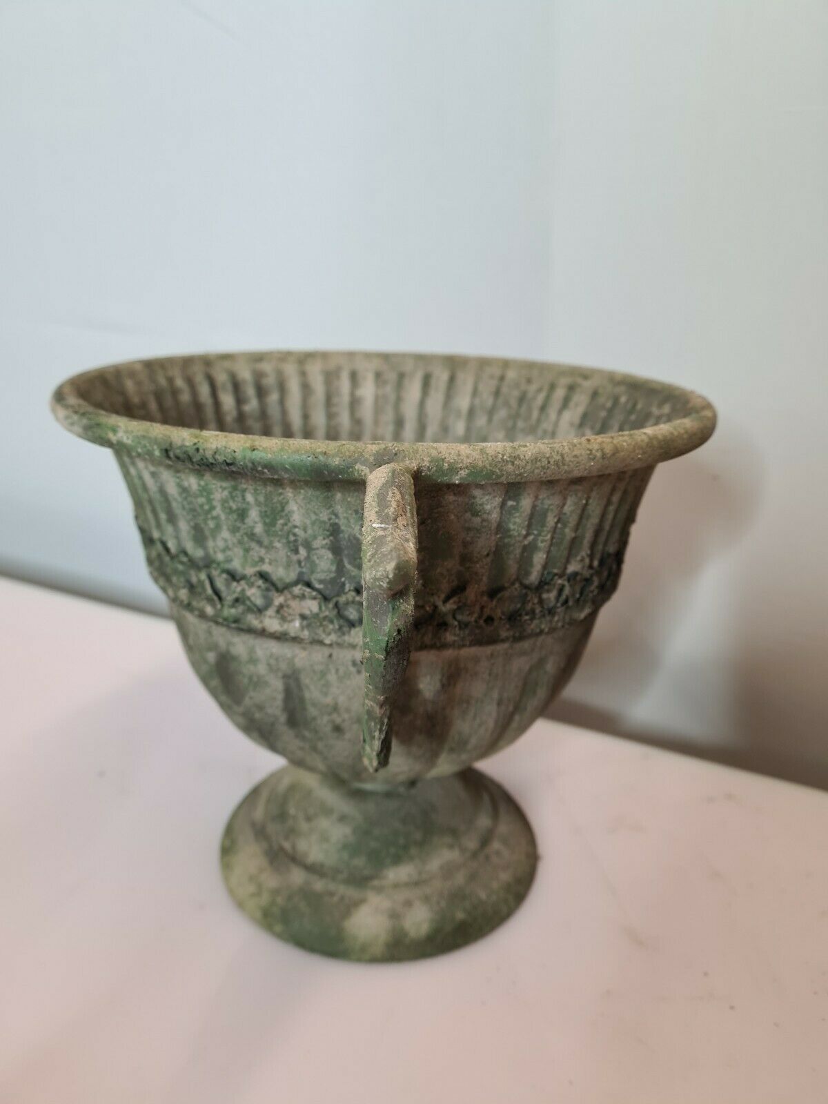 Medici in patinated iron