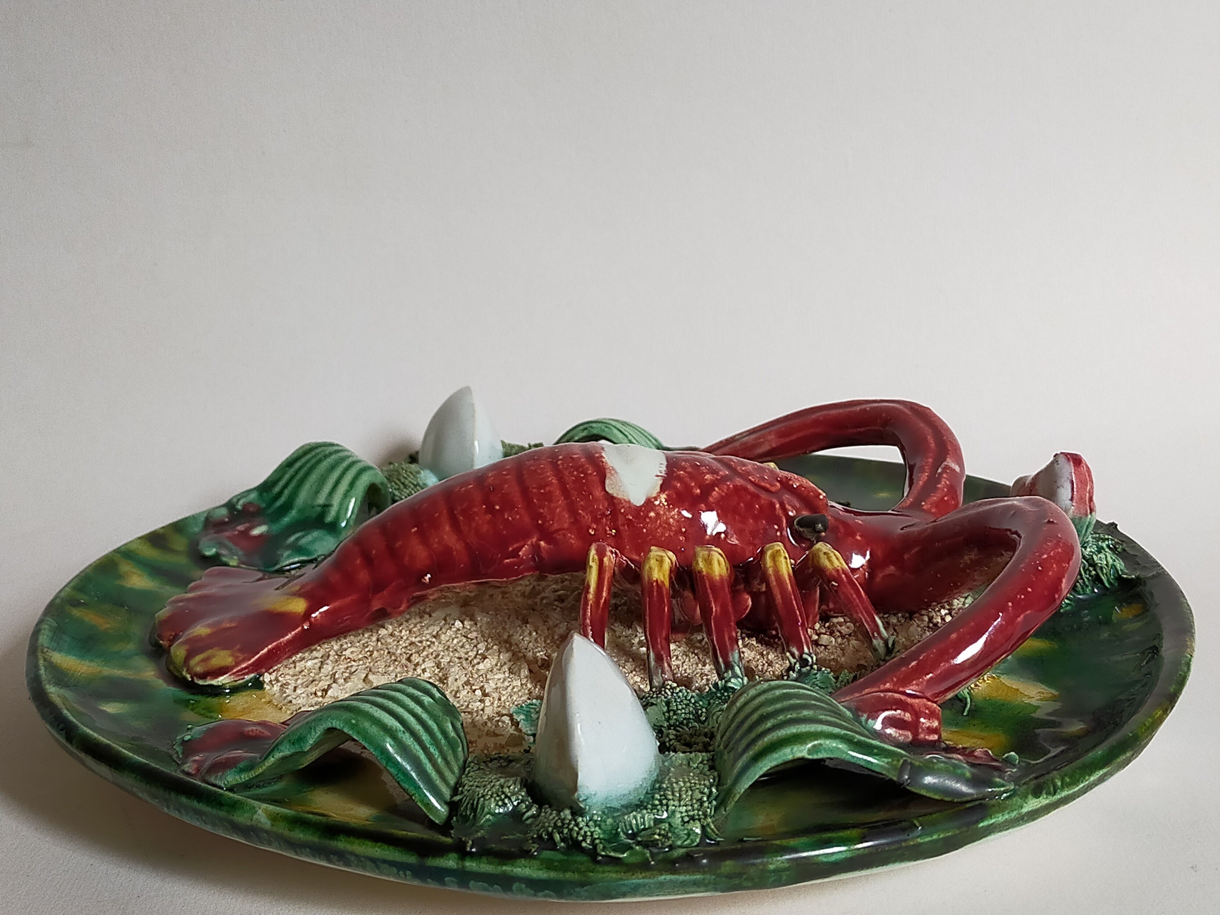 Plate in old barbotine with lobster