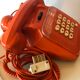Orange Socotel phone with keys from the 70s 80s