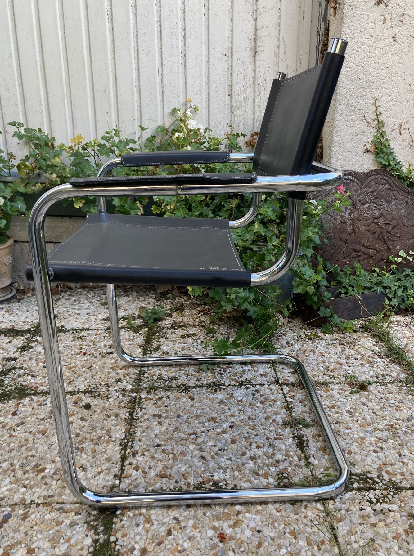 Vintage armchair in black leather