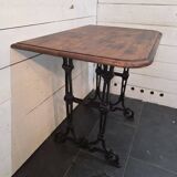Bistro table with cast iron legs and oak top