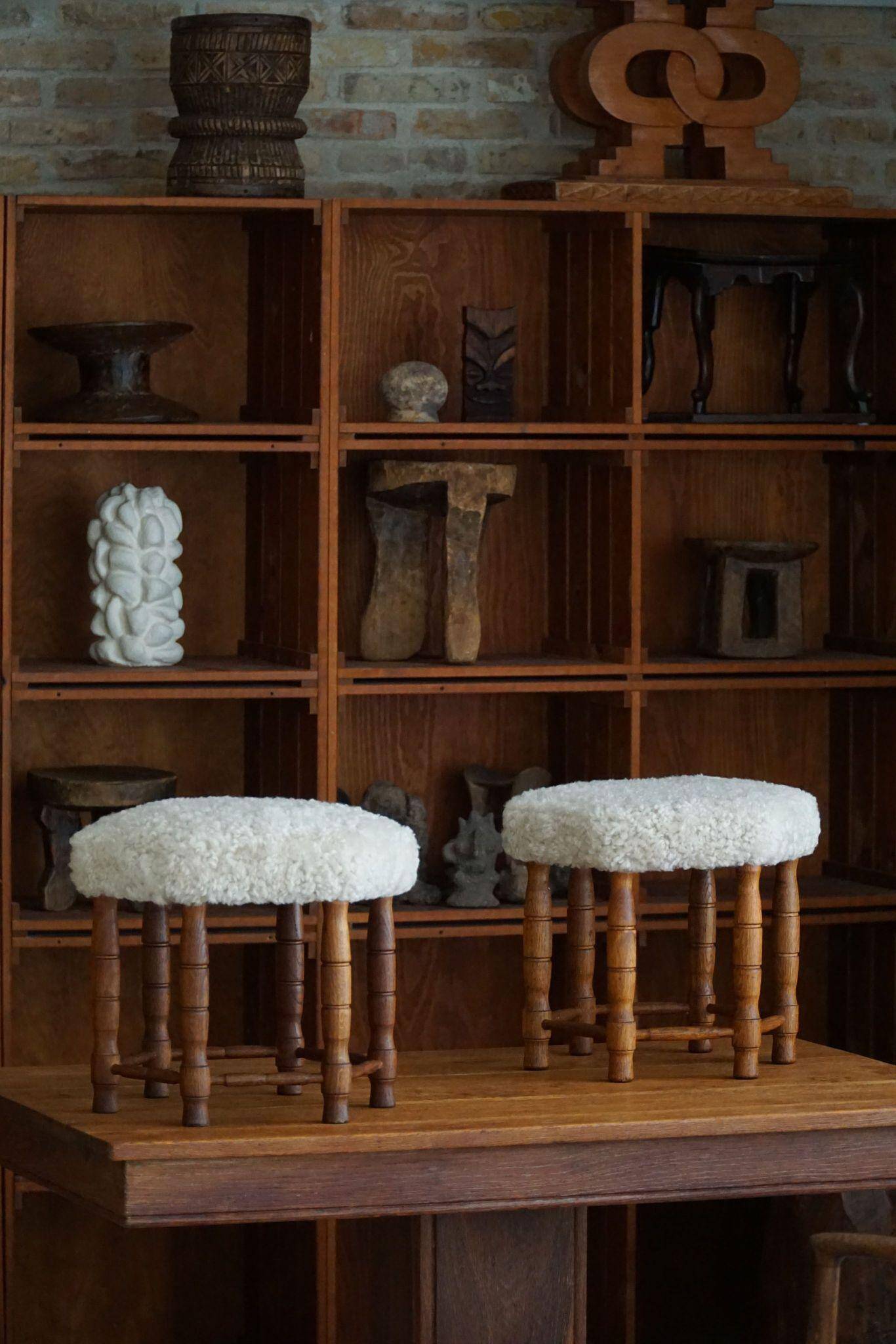Modern Danish, a hexagonal oak stool, seat reupholstered in lambswool, 1950s.