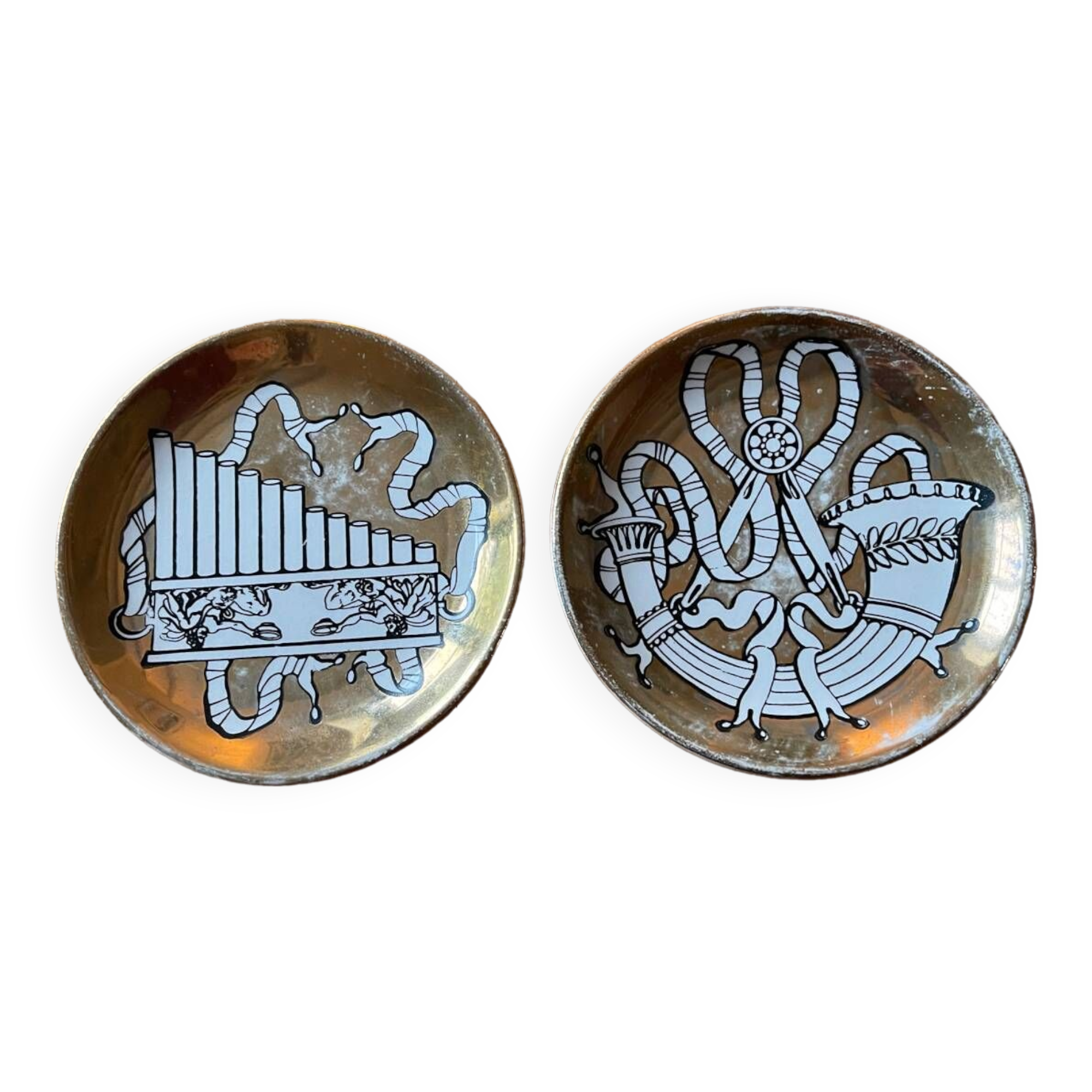 Small Fornasetti plates