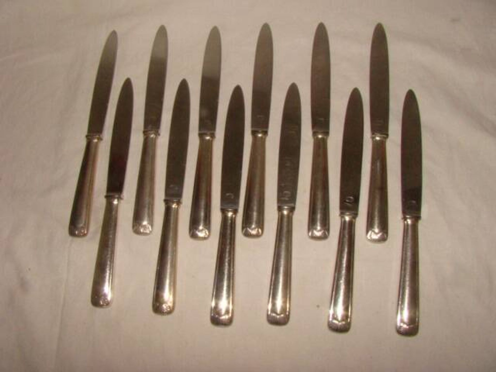 12 stainless steel table knives M.A. from the early 20th century.