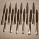 12 stainless steel table knives M.A. from the early 20th century.