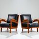 Pair of Belgian lounge chairs in solid oak with leather cushions