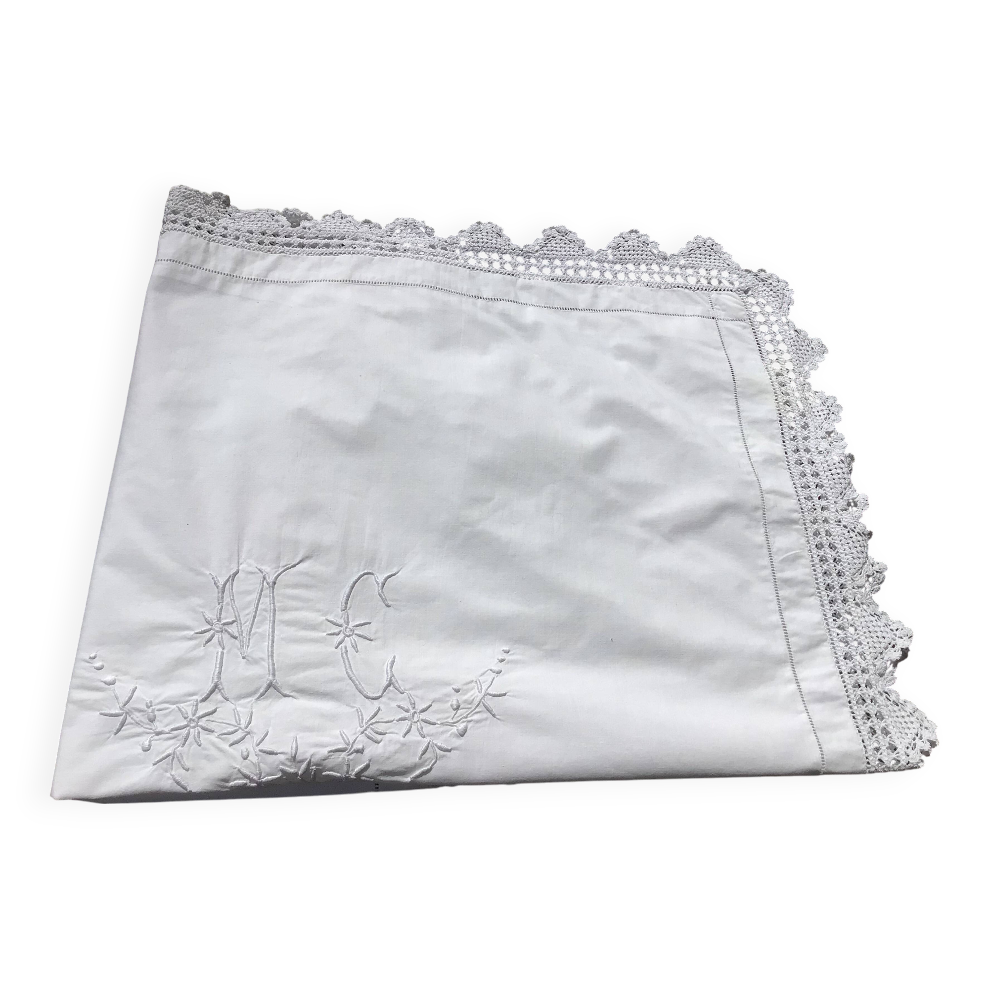 MC embroidered pillowcase with flower detailing and crocheted edge