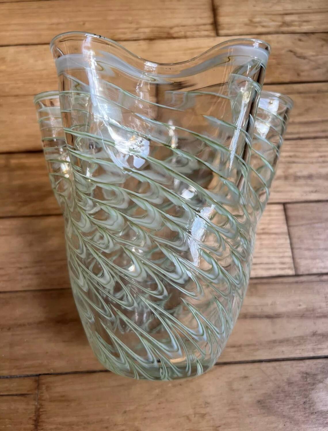 Filigree handkerchief-shaped glass vase with corolla neck