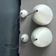 Pair of lacquered metal pendant lights with rose.