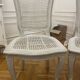 Set of 4 white caned chairs in Louis XV style.