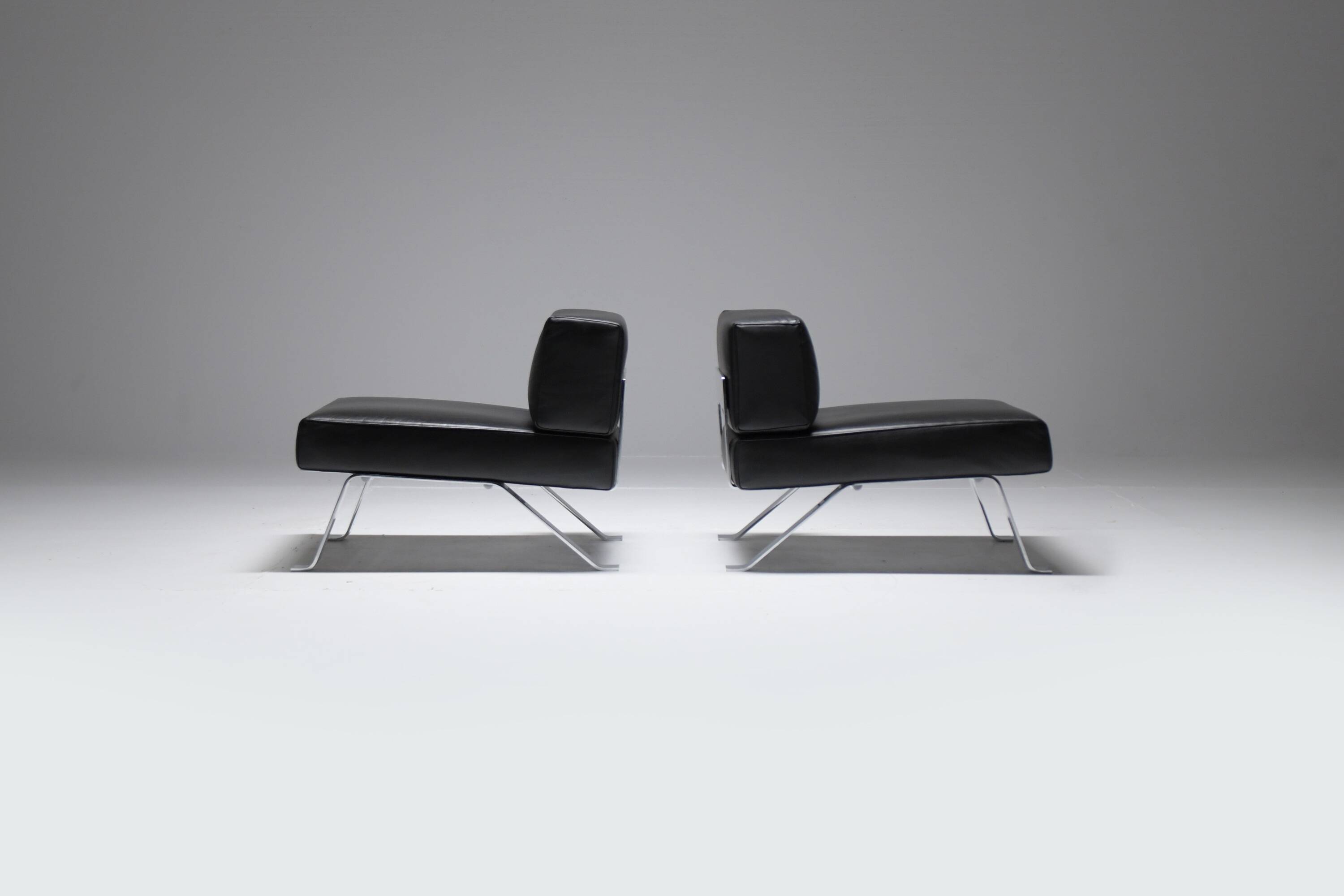 Black leather Ombra 512 lounge chairs by Charlotte Perriand for Cassina Italy