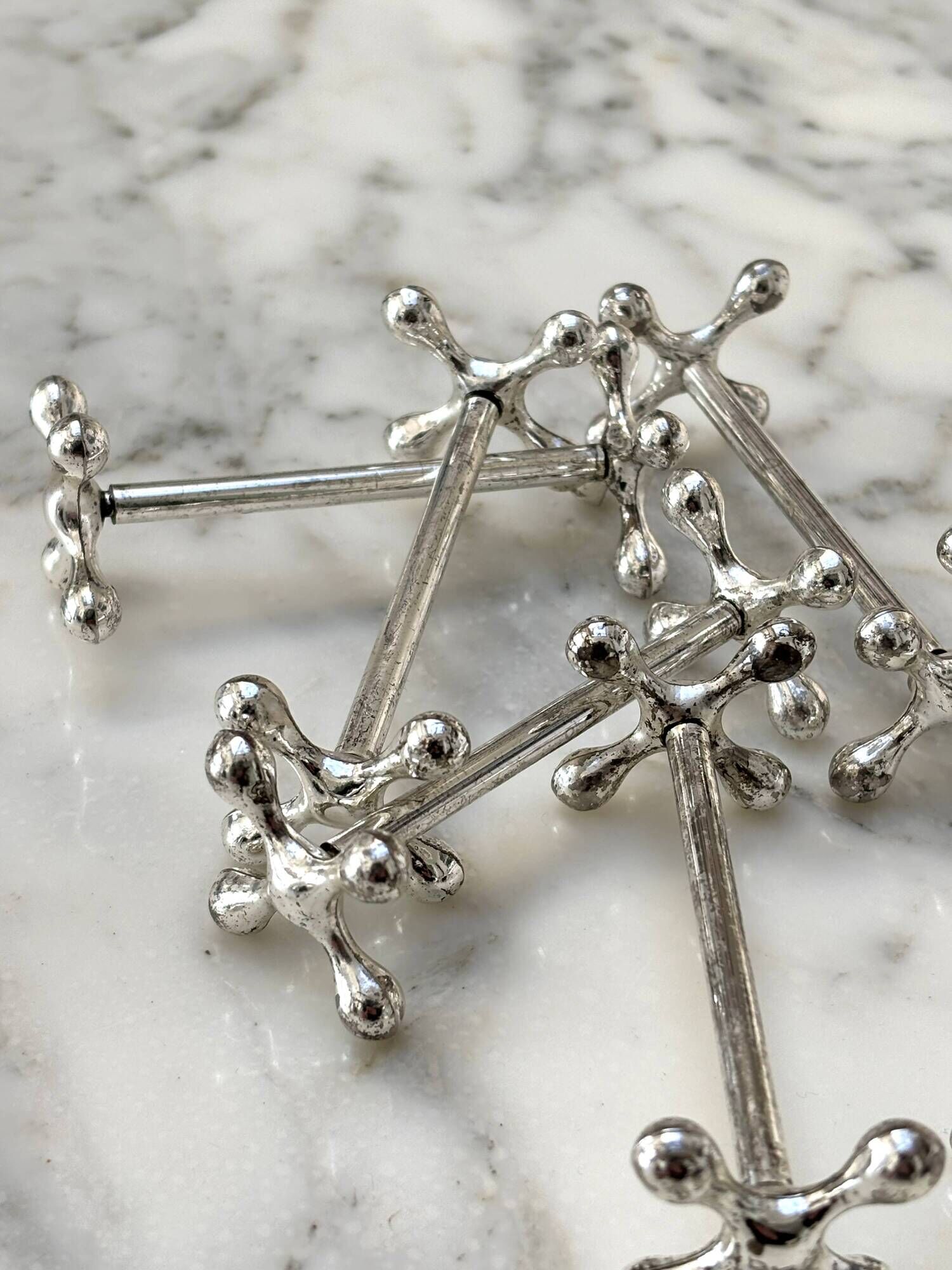 Set of 6 silver metal knife rests in the Letang Remy style