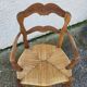 Provencal straw armchair in walnut
