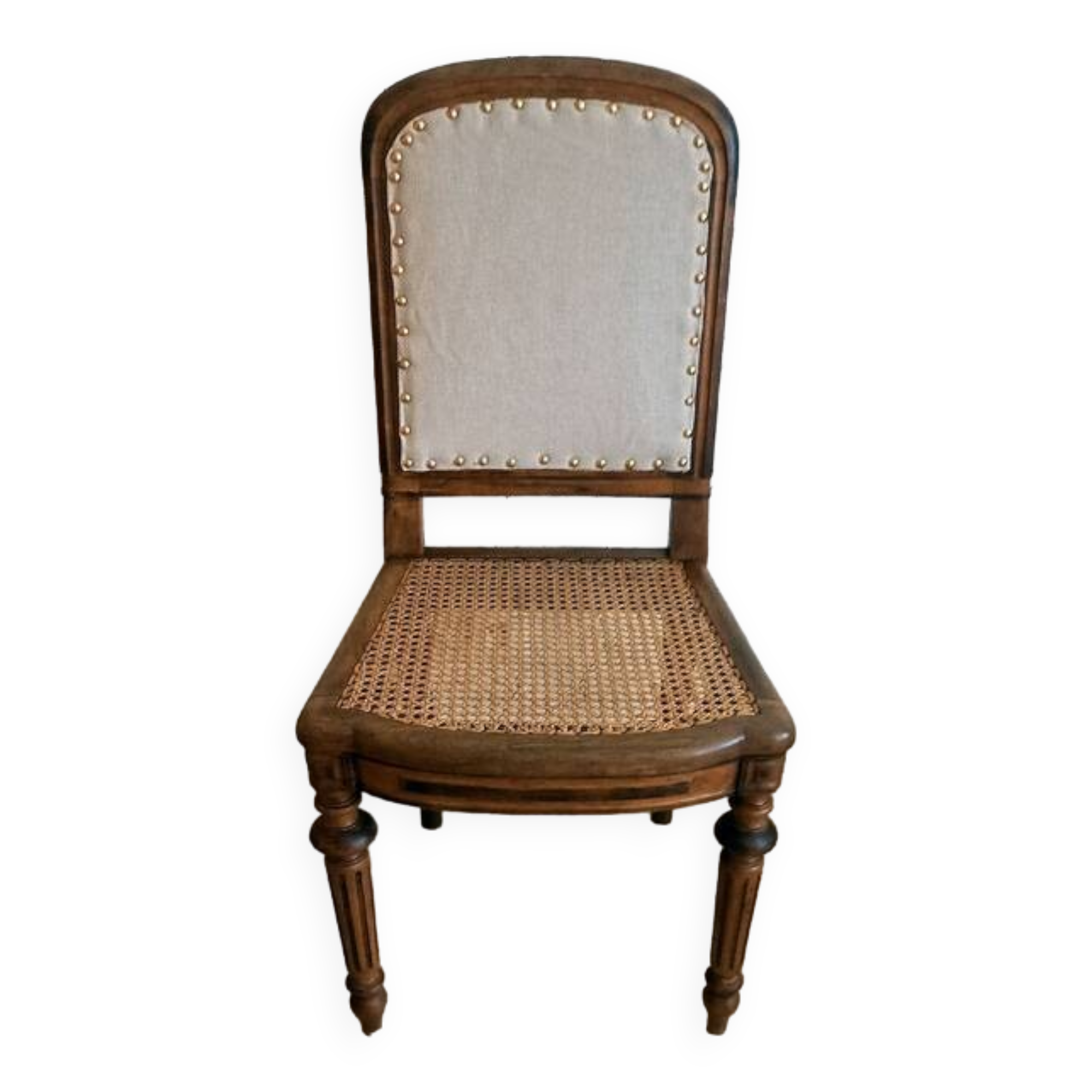Solid oak art deco chair with cane and fabric.