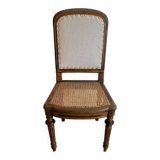 Solid oak art deco chair with cane and fabric.