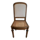 Solid oak art deco chair with cane and fabric.
