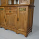 Art Nouveau oak buffet and dinanderie panels, circa 1910