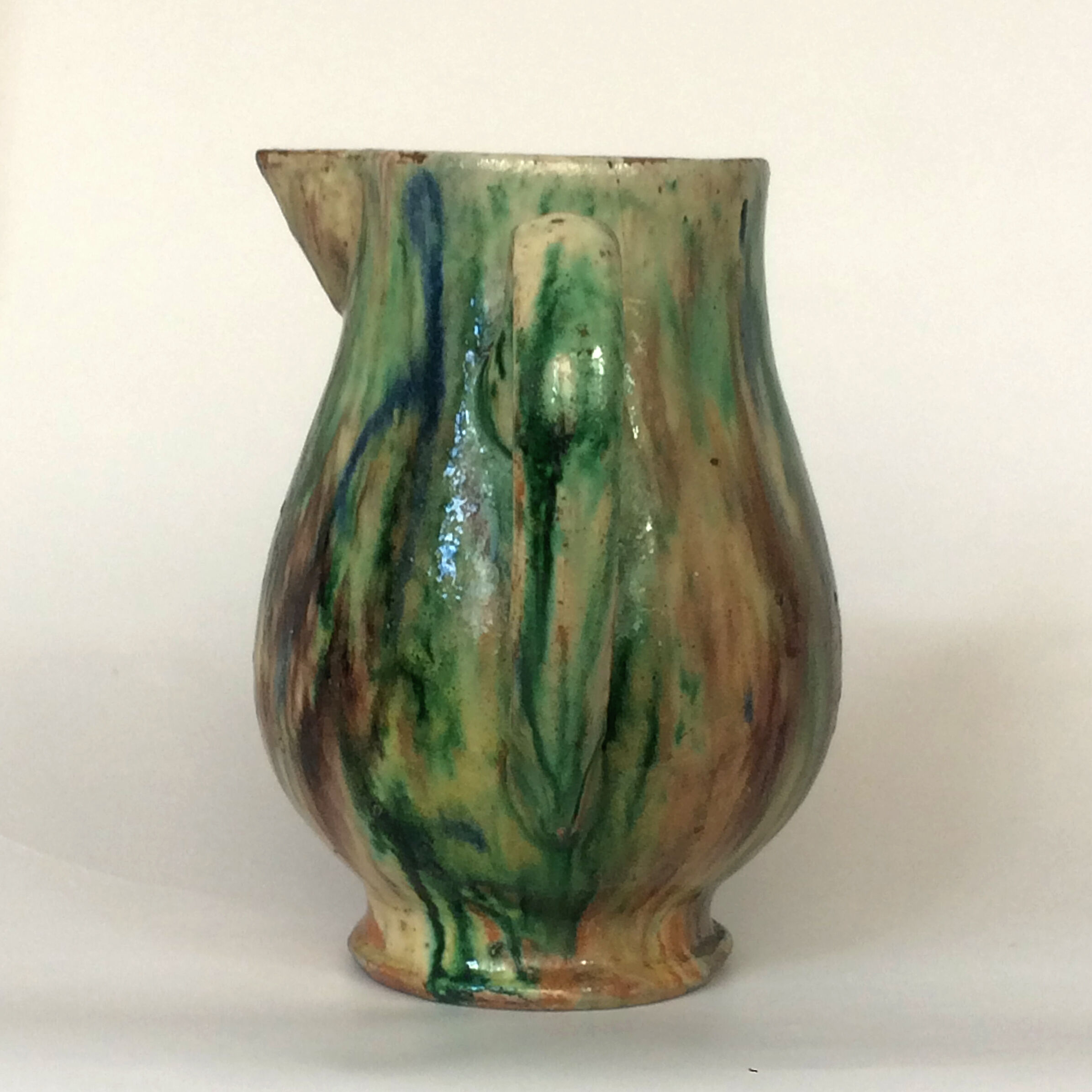 Glazed earth jug