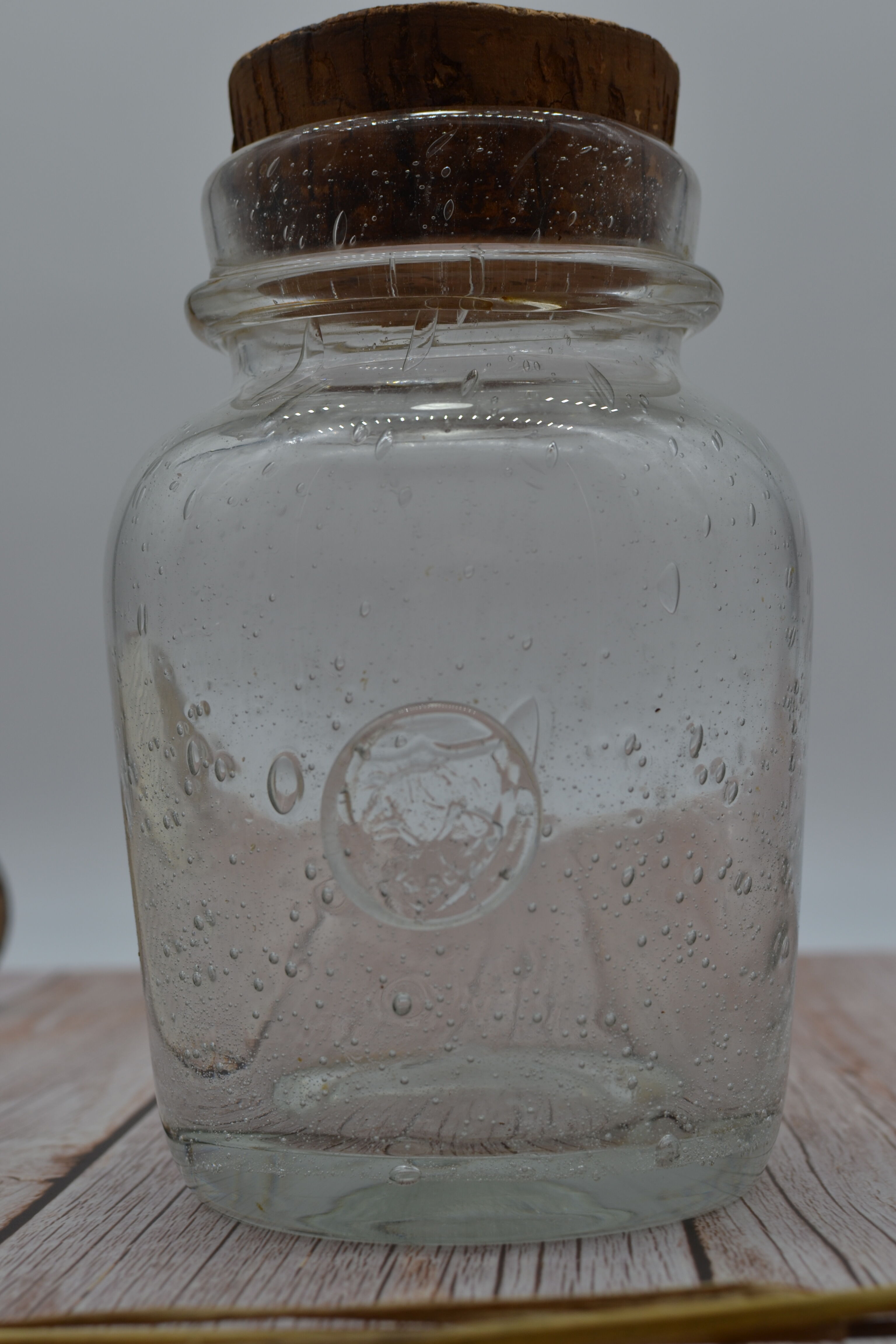 Blown glass jar with original cap