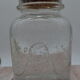 Blown glass jar with original cap