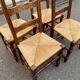 4 solid wood chairs with straw seats and high backs, 108cm.