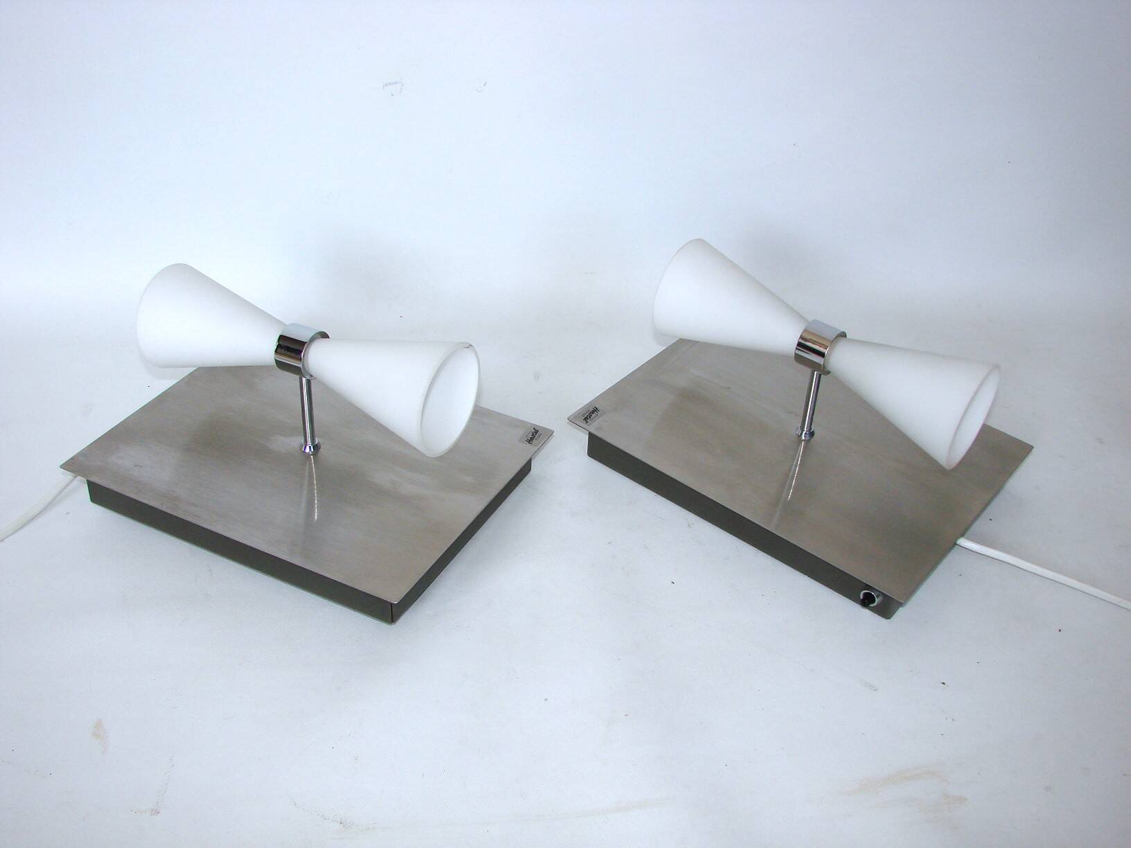 A pair of modern herstal wall lamps from the 2000s - stylish lighting for m