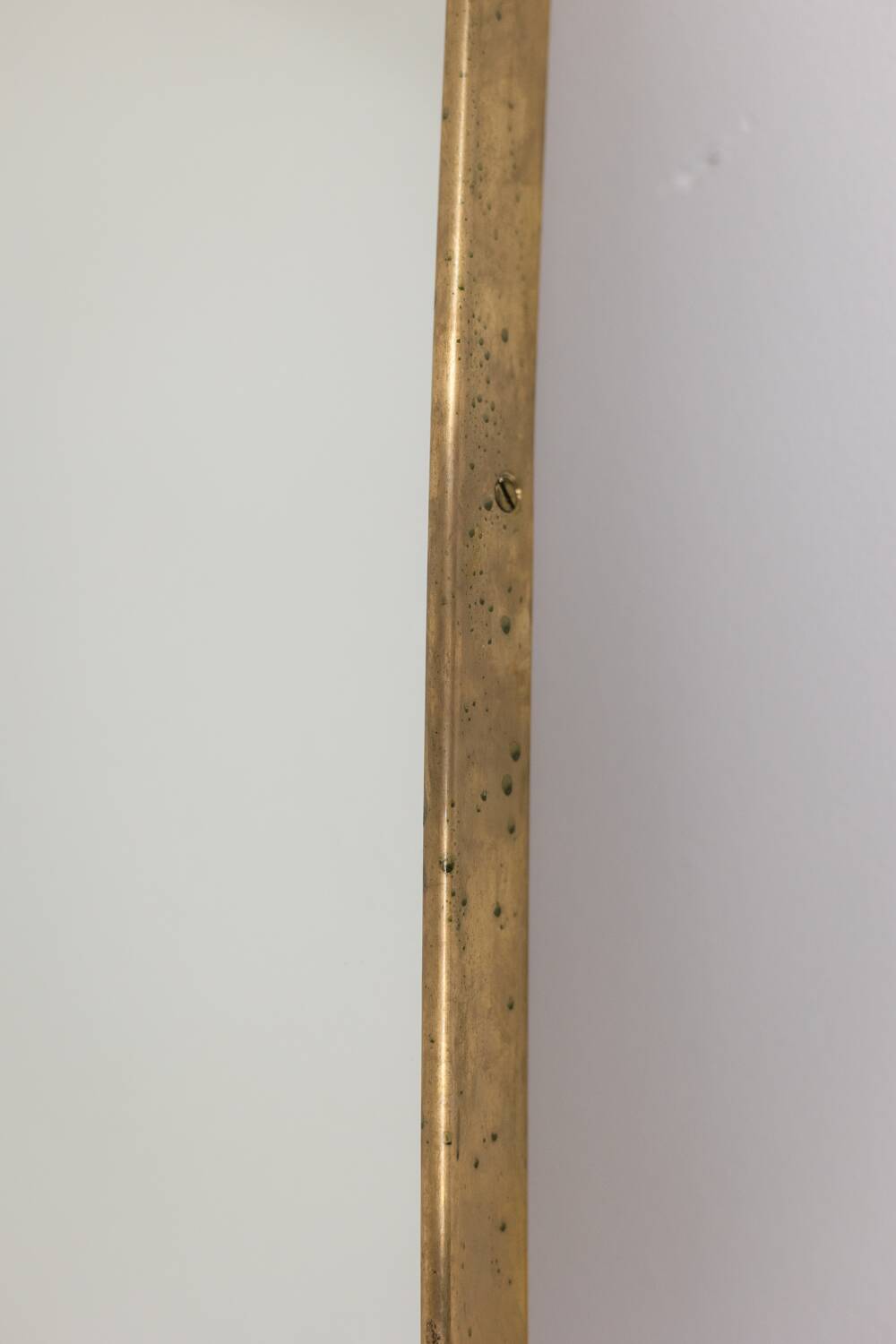 Mirror with a gilded brass frame. 1980s.